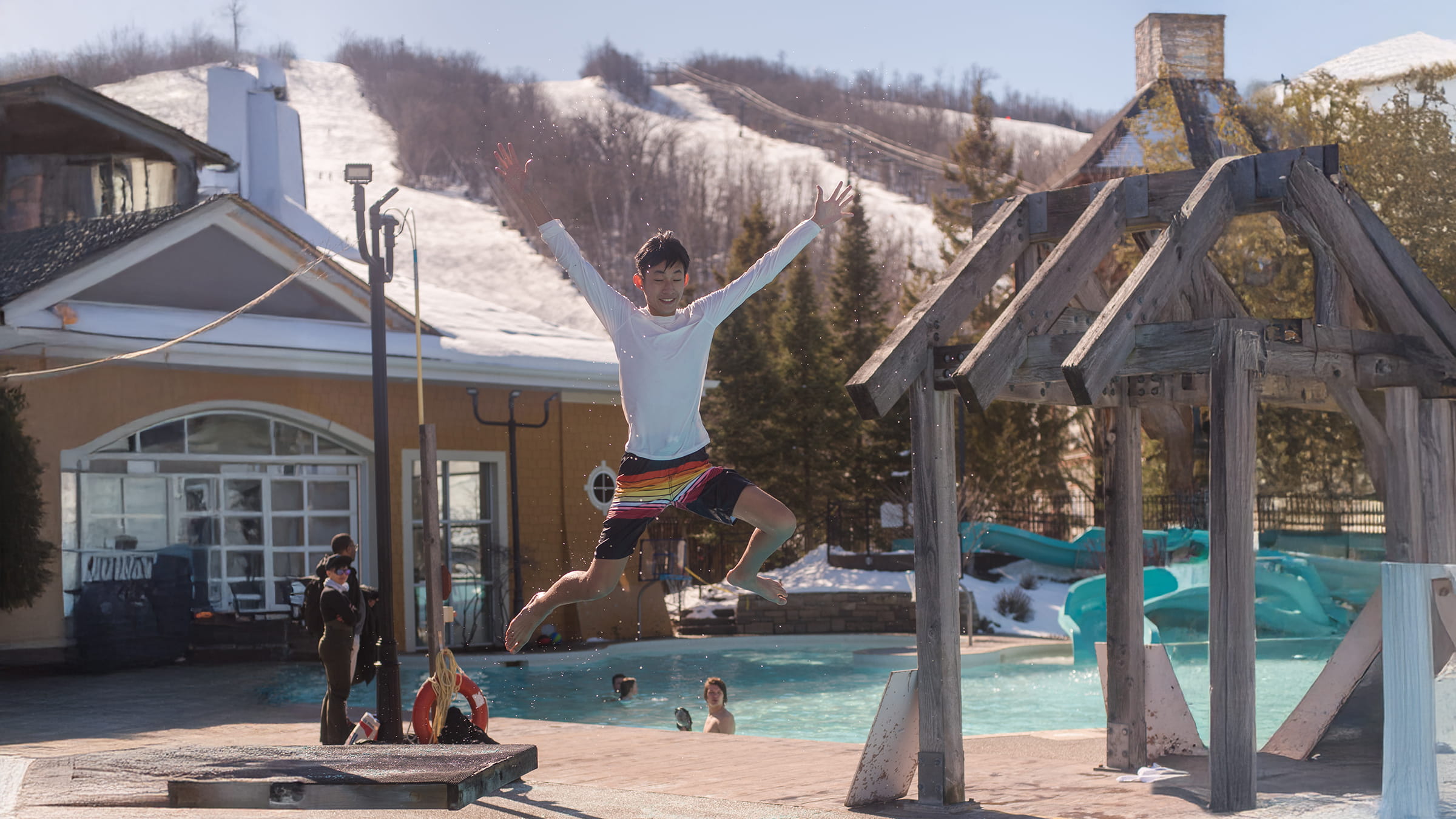 Plunge Aquatic Centre outdoor pool with Blue Mountain ski slopes