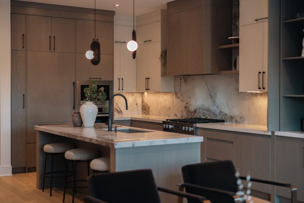 Clean modern kitchen with updated lighting and cabinets