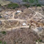 Aerial overview of the yard and woodland at 7 North Diagonal Road