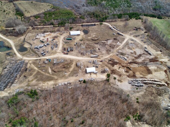 Aerial overview of the yard and woodland at 7 North Diagonal Road